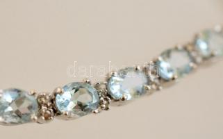 Ezüst(Ag) karkötő topáz és apró gyémánt kövekkel, jelzett, h: 19 cm, bruttó: 9,8 g