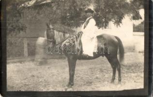 1936 Gulács, népviseletbe öltözött férfi feldíszített lovon. photo