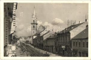 Beszterce, Bistritz, Bistrita; Mussolini utca, templom, F. Pardy, Kerekes J. üzeletei / street view, church, shops