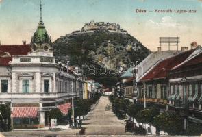 Déva, Kossuth Lajos utca, Orient és Fehér Kereszt szálloda, vár a háttérben / street, hotels, castle in the background (Rb)