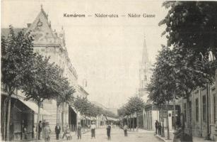 Komárom, Komárno; Nádor utca, üzletek, templom. L. H. Pannonia 1915. / street view, shops, church
