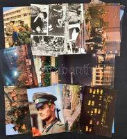 cca 1970 A Német Demokratikus Köztársaság által kiadott propaganda fotósorozat, 50 db képpel, köztük katonai díszszemle, katonák, fotómontázsok, hátoldalán feliratozva, szakad borítóval, 14x20 cm / German Democratic Republic propaganda photos, 14x20 cm