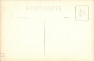 Katonai lovas akadályugratás közben / Military horseman during steeplechase. photo