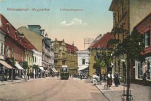 Nagyszeben, Hermannstadt, Sibiu; Heltauergasse / utcakép, villamos, üzletek. Emil Fischer kiadása / street view, tram, shops (fa)