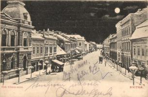 Nyitra, Nitra; Tóth Vilmos utca télen este, Weisz Lipót üzlete, Népbank / street view in winter at night, shops, bank (EK)