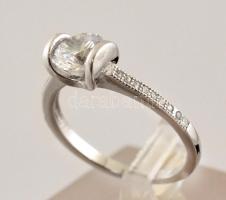 Ezüst(Ag) apró kövekkel kirakott gyűrű, jelzett, méret: 53, bruttó: 2,4 g