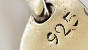 Ezüst(Ag) plasztikus kutyafej függő, jelzett, 4,2×2,3 cm, nettó: 23,5 g