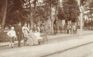 1911 Novszka, Novska; vasútállomás padon ülő hölgyekkel és vasutasokkal / Bahnhof / railway station with ladies sitting on a bench and railwaymen. photo (fl)