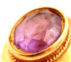 Arany (Au.) 14 K gyűrű csiszolt szintetikus ametiszt kővel, jelzett, bruttó: 4,6 g, méret:54