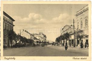 Nagykároly, Carei; Fő utca, üzletek, rendőr. Kiadja Gellis könyvkereskedés / main street, shops, policeman (EK)