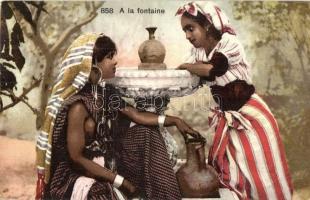 A la fontaine / Egyptian folklore, traditional costumes, ladies
