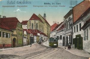 Nagyszeben, Hermannstadt, Sibiu; Vasút utca, Orsolya-rendi zárda, villamos, Fenig A. üzlete / Bahngasse, Ursulinen Kloster / street view with tram, nunnery and shops (EK)