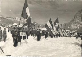 1941 Cortina dAmpezzo, FIS Alpine World Ski Championship. The Hungarian and Italian teams with swastika flag in the background (in 1946 FIS canceled the results because only Axis-friendly or neutral countries during World War II participated). Fotografia Ghedina, photo