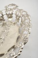 Ezüst (Ag.) áttört szélű kosár, jelzett, mesterjeggyel, préselt lemez, domborított,  42×26 cm, nettó...