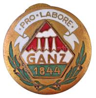 1944. Pro Labore Ganz 1844 zománcozott és aranyozott Cu jelvény, kiadva a Ganz 100. évfordulójára, hátoldalán MORZSÁNYI BUDAPEST VÁCI UTCA 36. gyártói jelzéssel (27mm) T:2 /  Hungary 1944. Pro Labore Ganz 1844 enamelled and gold plated Cu badge, issued for the 100th anniversary of the Ganz factory, with MORZSÁNYI BUDAPEST VÁCI UTCA 36. makers mark (27mm) C:XF