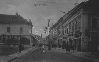 Eger, Fő utca, Fonciere pesti biztosító, üzletek, magyar zászlók (fa)