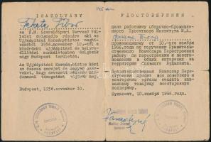 1956 Igazolvány az É.M. Szerelőipari Tervező Vállalat újjáépítési és helyreállítási munkálatokban részt vevő dolgozója részére, magyar és orosz nyelven, pecséttel, aláírással