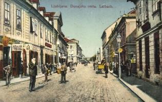 Ljubljana, Laibach; Dunajska cesta / street view, tram, shop of K. Camernik