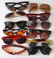 Piros  műbőr kulcsos koffer, kulccsal, jó állapotban, benne 12 db napszemüveg, közte 4 db sport naps...