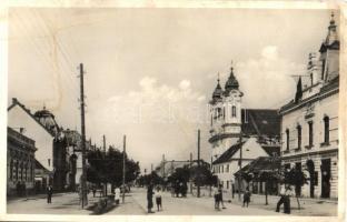 Galánta, Fő utca, Hitelbank, üzletek, katolikus templom / main street, bank, shops, Catholic church (EK)