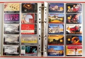 Kb. 500 db magyar telefonkártya, albumba rendezve, 1 db katalógussal, meghívóval