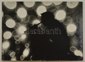 cca 1976 Hack László: Furulyázó, feliratozott, vintage fotóművészeti alkotás, kasírozva, a magyar fotográfia avantgarde korszakából, 30x40 cm