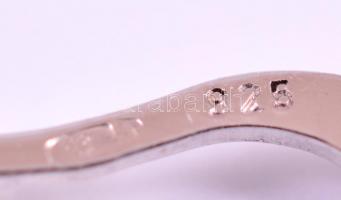 Ezüst(Ag) ívelt karika fülbevalópár, jelzett, d: 3,2 cm, nettó: 4,4 g