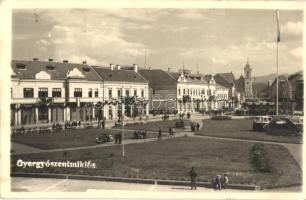 1940 Gyergyószentmiklós, Gheorgheni; tér, országzászló, Munka biztosító, bevonulás, "Magyarország feltámadott" és "Éljen Horthy MIklós" feliratú szalag / entry of the Hungarian troops, Hungarian flag. photo + "1940 Gyergyószentmiklós visszatért" So. Stpl