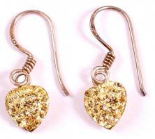 Ezüst(Ag) sárga strasszokkal díszített szívecskés fülbevalópár, jelzett, bruttó: 1,1 g