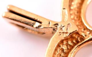 Arany (Au.) 14 K medál apró gyémántokkal, jelzett, bruttó: 1,9 g