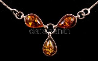 Ezüst (Ag.) nyaklánc borostyán kövekkel, jelzett, bruttó: 5,5 g