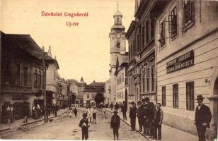 Ungvár, Uzshorod, Uzhorod; Új tér, Katolikus templom, Lefkovits Jakabné zálogkölcsön intézete, Révész, Friedmann Adolf üzlete. W. L. (?) 394. Kiadja Steinfeld Dezső / street view, Catholic church, loan bank, shops