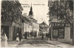1916 Károlyváros, Karlovac; Rakovacka ulica / utcakép, Ivan Lach üzlete, étterem, raktár. Kiadja L. Reich / street view, shops, restaurant, warehouse (EK)