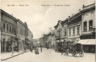 Újvidék, Novi Sad; Duna utca, Gruics K. üzlete, villamos Eternit Pala reklámmal / street view, shops, tram with advertisement (vágott / cut)