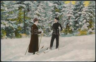 Couple skiing on the edge of the forest, winter sport