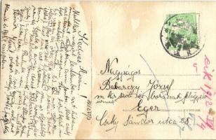 1912 Man wearing a hat with tennis racket. photo (fl)