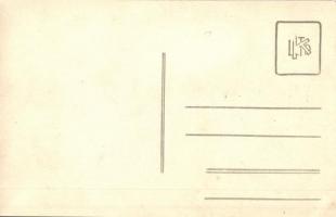 Four men with tennis rackets behind the tennis court. photo