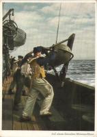 Auf einem deutschen Minensuchboot. PK-Aufn. Kriegsber. Schlemmer, Carl Werner / WWII German Navy, mariners on a minesweeper (EK)
