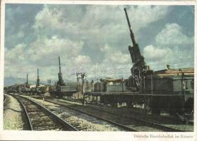 Deutsche Eisenbahnflak im Einsatz. PK-Aufn. Kriegsber. Meinhold, Carl Werner / WWII German military, machine guns transported by railway  (EK)