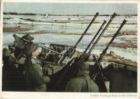 Leichte Vierlings-Flak schützt einem Flugplatz an der Ostfront. PK-Aufn. Kriegsber. C. Berger, Carl Werner / WWII German military, air raid machine guns (EK)