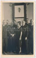 Tisztviselők, hivatalnokok csoportképe Adolf Hitler portréja előtt, horogkeresztes zászlók / Officers group photo in front of Adolf Hitlers portrait, swastika flags. photo