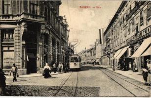 Zagreb, Zágráb; Ilica, Kavana Bauer, L.F.Ko., Vjekoslava N. / street view with shops and tram, cafe, Hungarian flags / utcakép üzletekkel és villamossal, kávéház, magyar zászlók. W.L. Bp. 1911-13. (fl)