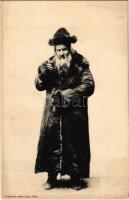 Jewish man in winter coat with drink. Wydawn. Artysty Stanislawów Ser. G.T.Z. No. 5.
