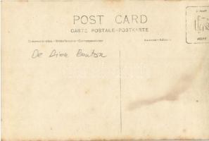 Vintage De Dion-Bouton automobile in winter, four spare tires. photo