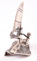 Ezüst(Ag) szörföző női figura, jelzett, m: 6 cm, nettó: 31,6 g