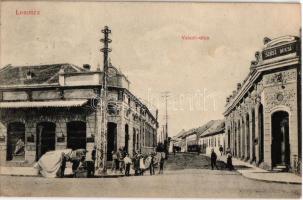 1914 Losonc, Lucenec; Vasúti utca, Szüsz Miksa üzlete, piac árus. Redlinger kiadása / railway street with shops, vendor