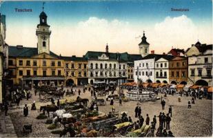 1915 Cieszyn, Teschen; Demelplatz / market square with vendors horse carts, trams, pharmacy. Ed. Feitzinger No. 1146.
