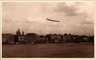 Budapest V. Széchenyi tér, Lánchíd, háttérben a Bazilika, Graf Zeppelin LZ-127 léghajó a Duna fölött. photo