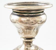 Ezüst (Ag.) gyertyatartó párban, jelzett, mesterjeggyel (K.K.), vésett díszítésekkel, apró horpadáso...