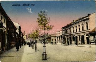 Losonc, Lucenec; Rákóczi utca, Szálloda a magyar királyhoz, raktár üzlet. Filó Marcell kiadása / street view with hotel and shops